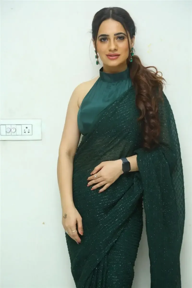 TOLLYWOOD ACTRESS PRIYANKA REWRI IN GREEN SAREE AT PREMA DESHAPU YUVARANI MOVIE 9